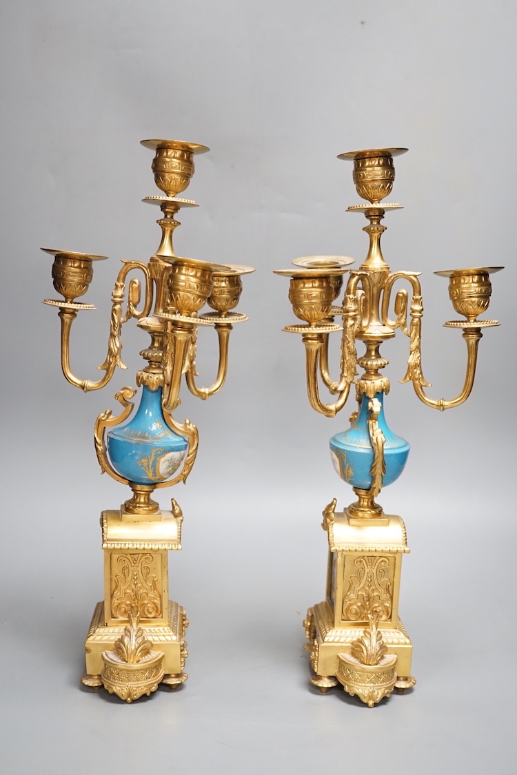 A pair of Louis XVI style ormolu and Sevres style porcelain candelabra 39cm